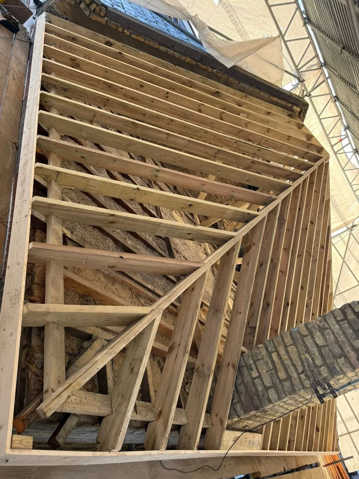 New roof timbers and rafters during a re-roof in Marazion